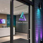 Custom UV transfer logo applied to a modern office glass door